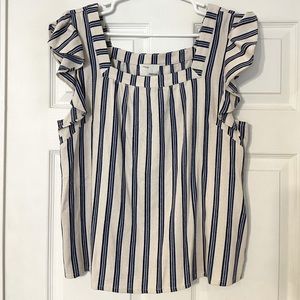 Striped blue and off white sleeveless blouse